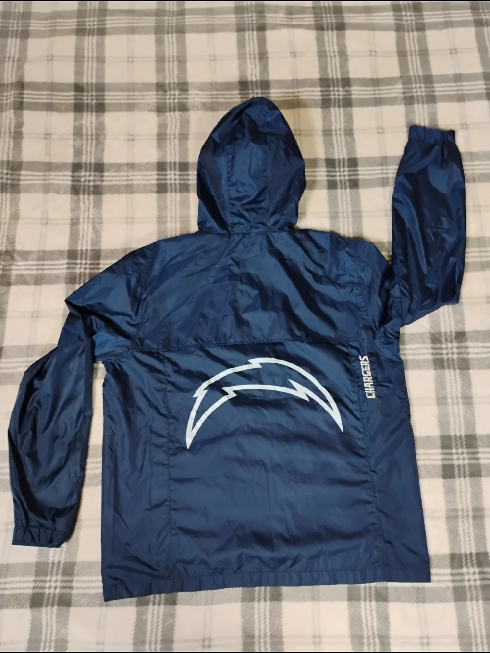 NFL Black Jacket with Red and Blue Shield Logo